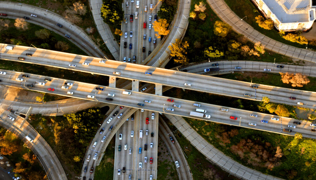 Transportation Investment Wins Big at the Ballot Box Helicopter Aerial View of the famous Los Angeles Four Level freeway interchange