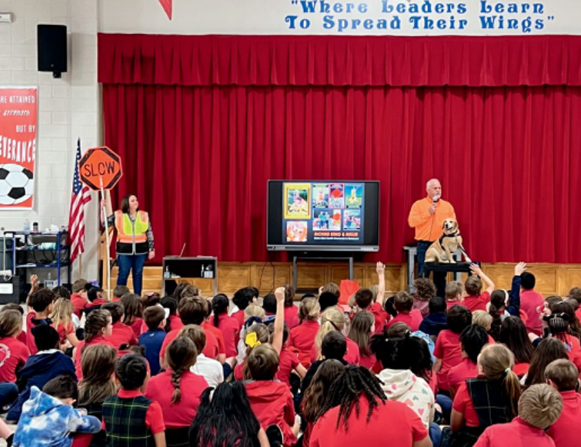 Millie visits schools throughout Alabama promoting work zone safety.